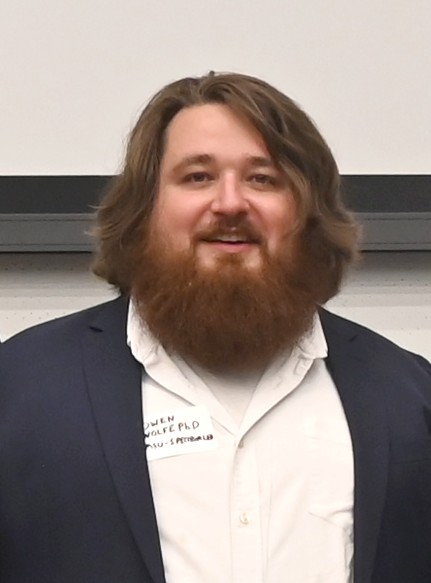 Staff headshot of Owen Wolfe