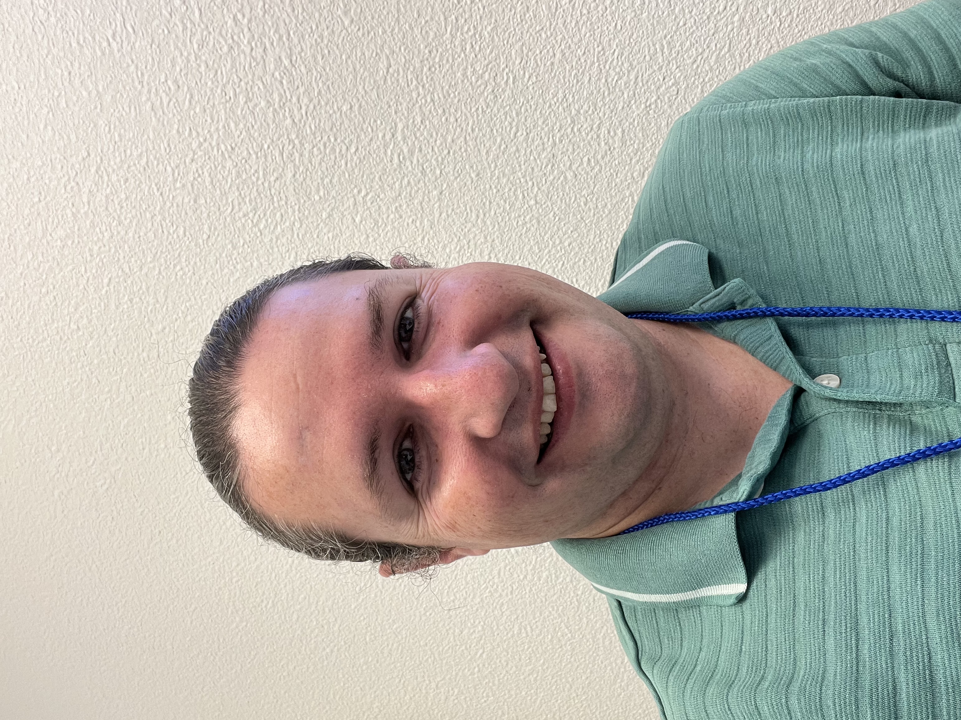 Staff headshot of Dr. Richard Escalante